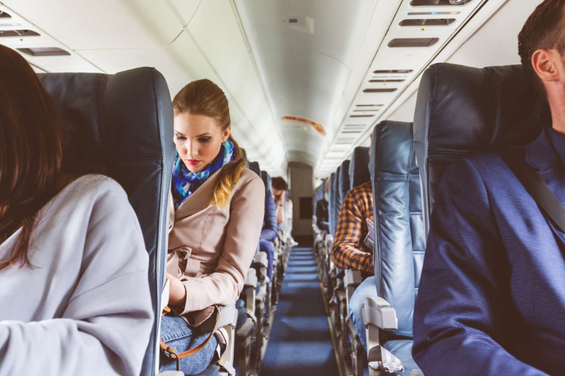 Is It Better to Sit on the Left or Right Side of the Plane? Frequent Fliers Weigh In